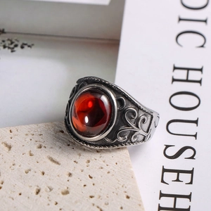 Vintage silver-tone men's ring with large oval red gemstone and baroque engravings
