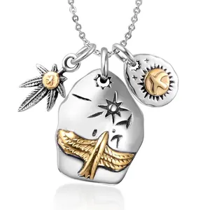 Retro punk eagle pendant necklace in silver and gold with sun and feather motifs