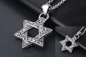 Close-up of vintage hexagram pendant with intricate Celtic knot textures and blackened finish