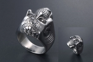 Detailed view of Gothic skull ring featuring vintage punk engravings in durable titanium steel