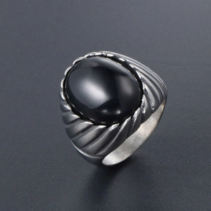 Vintage stainless steel ring for men featuring an oval black agate stone in retro style