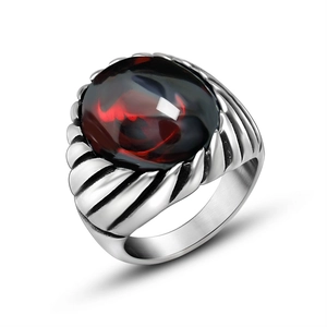Retro men's stainless steel ring featuring a vintage twisted texture and oval red agate stone
