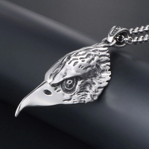 Retro eagle head pendant necklace in stainless steel with detailed feather texture and ball chain