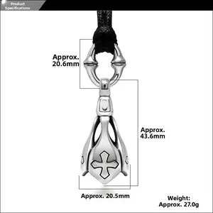 Macro detail of punk lotus cross pendant in titanium steel with product dimensions