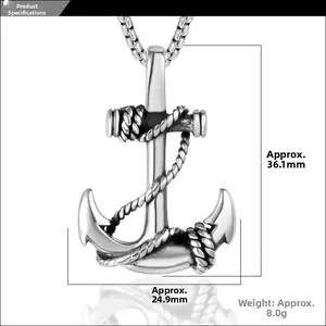 Macro shot of vintage silver anchor pendant with rope details and size dimensions