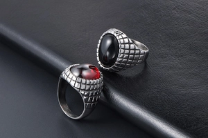 Detail showing vintage mesh texture bands with oval black and red agate gemstones