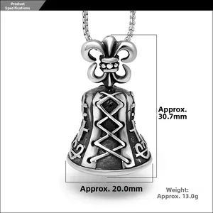 Macro view of gothic bell pendant with fleur-de-lis and cable details, 30.7mm x 20.0mm