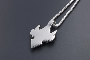 Macro view of polished steel Phoenix pendant on box chain with sleek metallic finish