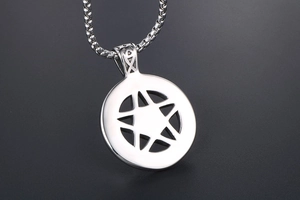 Close-up of polished titanium steel pentagram pendant with durable box chain necklace