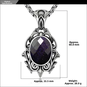Macro detail of retro teardrop necklace with purple sandstone and ornate filigree