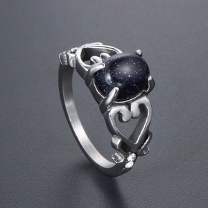 Anello vintage in acciaio inossidabile con pietra blu ovale e fascia a cuore cavo