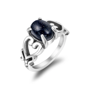 Anello retrò in acciaio al titanio con pietra di sabbia blu e lati a forma di cuore