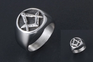 Detailed view of silver titanium steel ring with engraved Masonic Square and Compass symbol