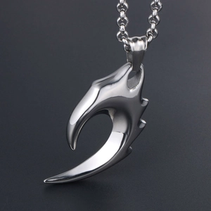 Collier avec pendentif griffe en acier titane poli et chaîne à boules classique pour homme