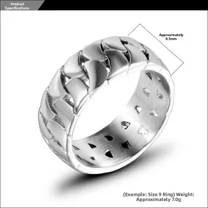 Macro view of men's Cuban link chain ring with triangle hollow interior details