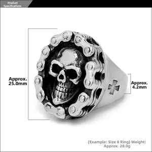 Macro detail of retro skull ring showing vintage finish and bike chain border design