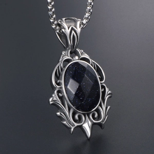 Vintage gothic teardrop necklace with blue sandstone in silver filigree frame