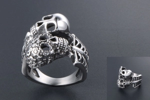 Macro detail of gothic skull ring featuring polished finish and intricate bone textures