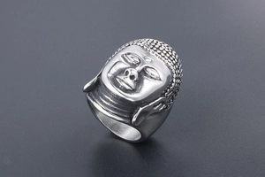 Detailed close-up of retro silver Buddha head ring in matte titanium steel finish