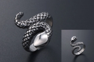 Close-up of punk snake ring showing detailed 3D scales and polished silver finish