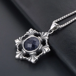 Retro titanium steel necklace with blue sandstone pendant on black leather background