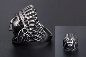 Macro side profile view of vintage stainless steel Indian chief ring with feather details