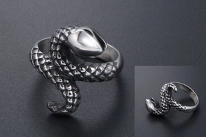 Macro detail of punk style snake ring showing intricate scales and polished steel texture