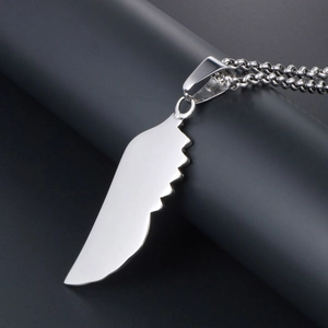 Minimalist wing pendant necklace in silver stainless steel with polished finish and ball chain