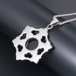 Hexagram pendant necklace with blue sandstone inlay and silver heart-shaped cutouts
