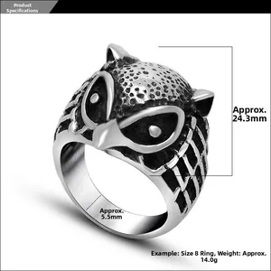 Detailed view of vintage owl ring in stainless steel with antique finish and wide band