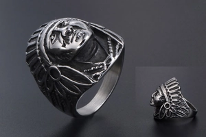 Macro detail of vintage punk style Indian chief ring with oxidized steel textures
