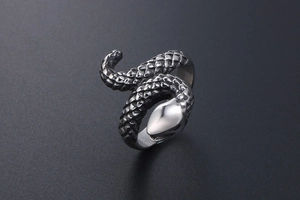 Macro detail of gothic snake ring showing vintage scales and oxidized steel texture