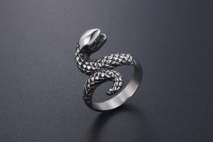 Macro shot of punk snake ring showing detailed metal scales and polished titanium steel