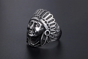 Macro shot of Indian Chief head ring featuring vintage punk style and feather details