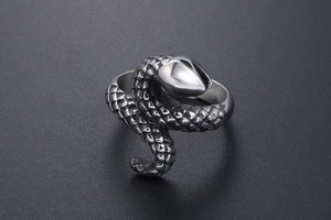 Detailed close-up of punk style snake ring with intricate scale texture in titanium steel