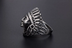 Detailed close-up of retro punk stainless steel ring with Indian chief feather design