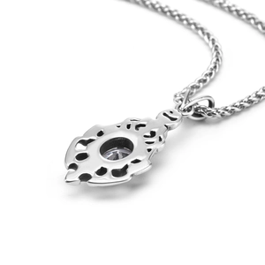 Elegant flame shaped stainless steel necklace with sparkling white gemstone pendant