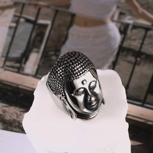 Polished silver stainless steel Buddha head ring with intricate religious carving details