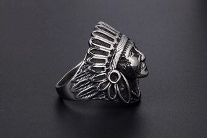 Detailed view of vintage Indian chief titanium steel ring with intricate feather headdress