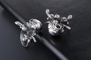 Macro detail of vintage silver stainless steel skull ring with distinct anatomical design