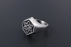 Detailed close-up of retro stainless steel star ring with hexagon relief and oxidized finish