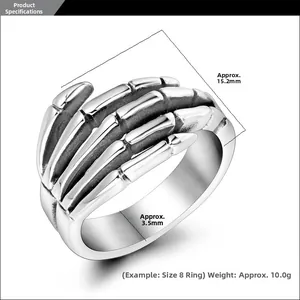 Detail showing dimensions of vintage punk skull hand ring in polished cast stainless steel