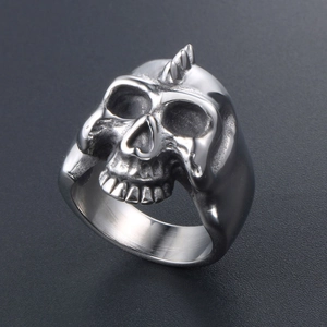 Punk style stainless steel skull ring with mohawk design shown from a side view