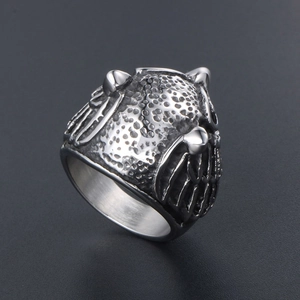 Vintage silver owl ring in stainless steel with detailed wing carvings and owl eye texture