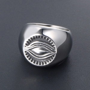 Vintage stainless steel Eye of Providence ring with silver relief detail and retro finish
