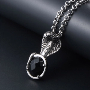 Vintage male cobra pendant necklace with black gemstone and detailed scale texture