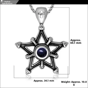 Détail macro du pendentif étoile en grès bleu montrant les dimensions 44,1x34,1mm