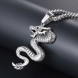 Gothic dragon pendant necklace in polished titanium steel with intricate scale textures