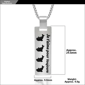 Detail showing dolphin pendant dimensions 29.6mm by 9.9mm with Je t'aime engraving