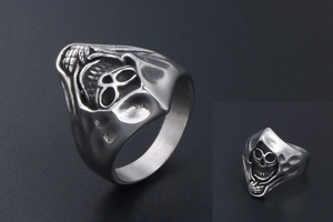 Macro view of vintage titanium steel grim reaper ring with hammered hood texture